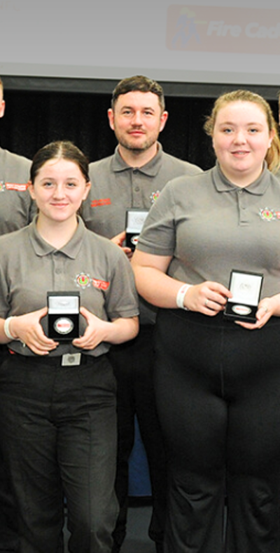 Group of youth volunteers with their awards