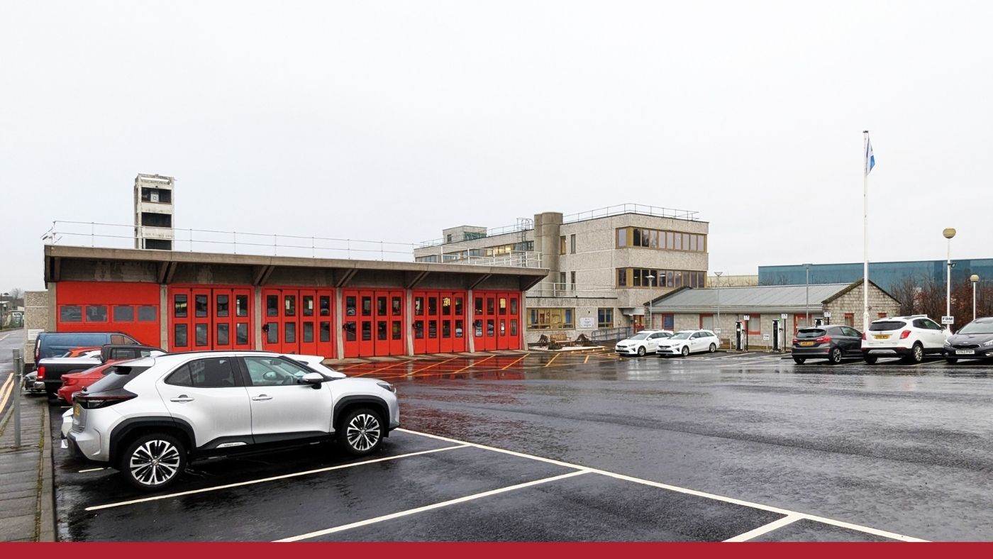 Image of Perth Community Fire Station on a dull rainy day with cars in the car park